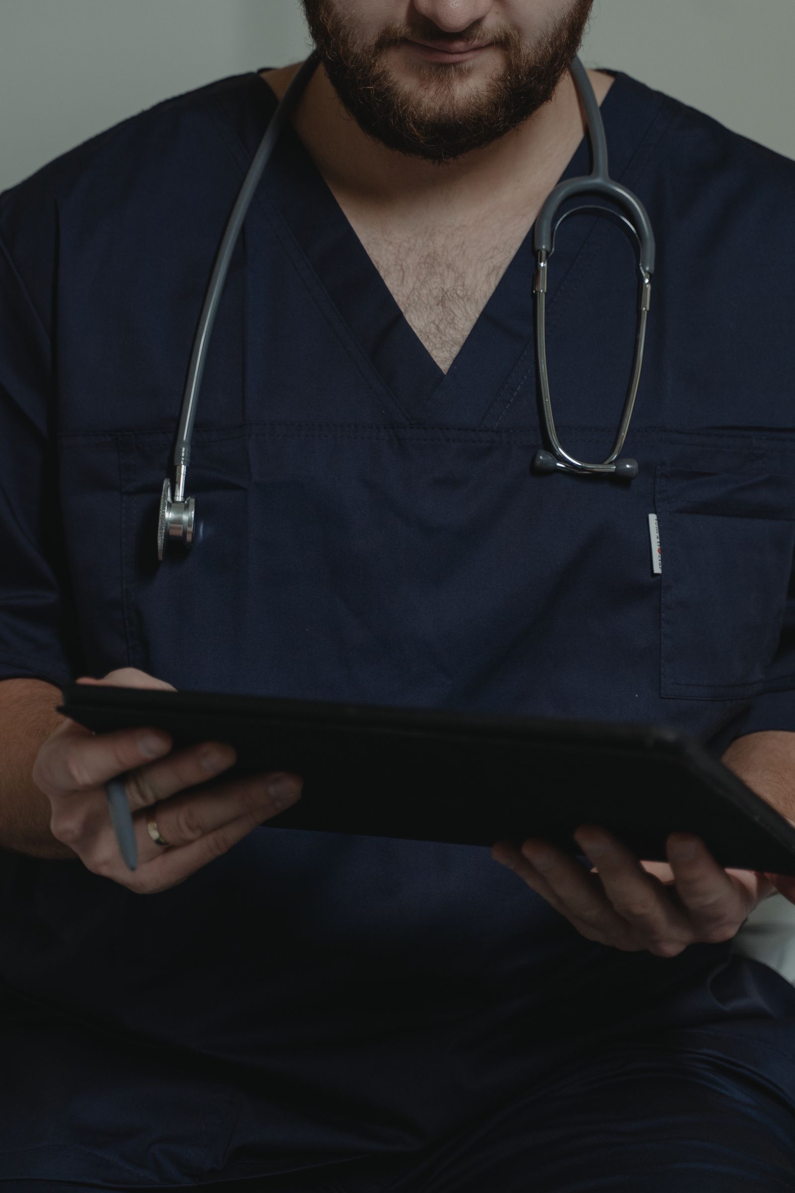 Medical professional reviewing an AI-powered diagnostic scan on a screen